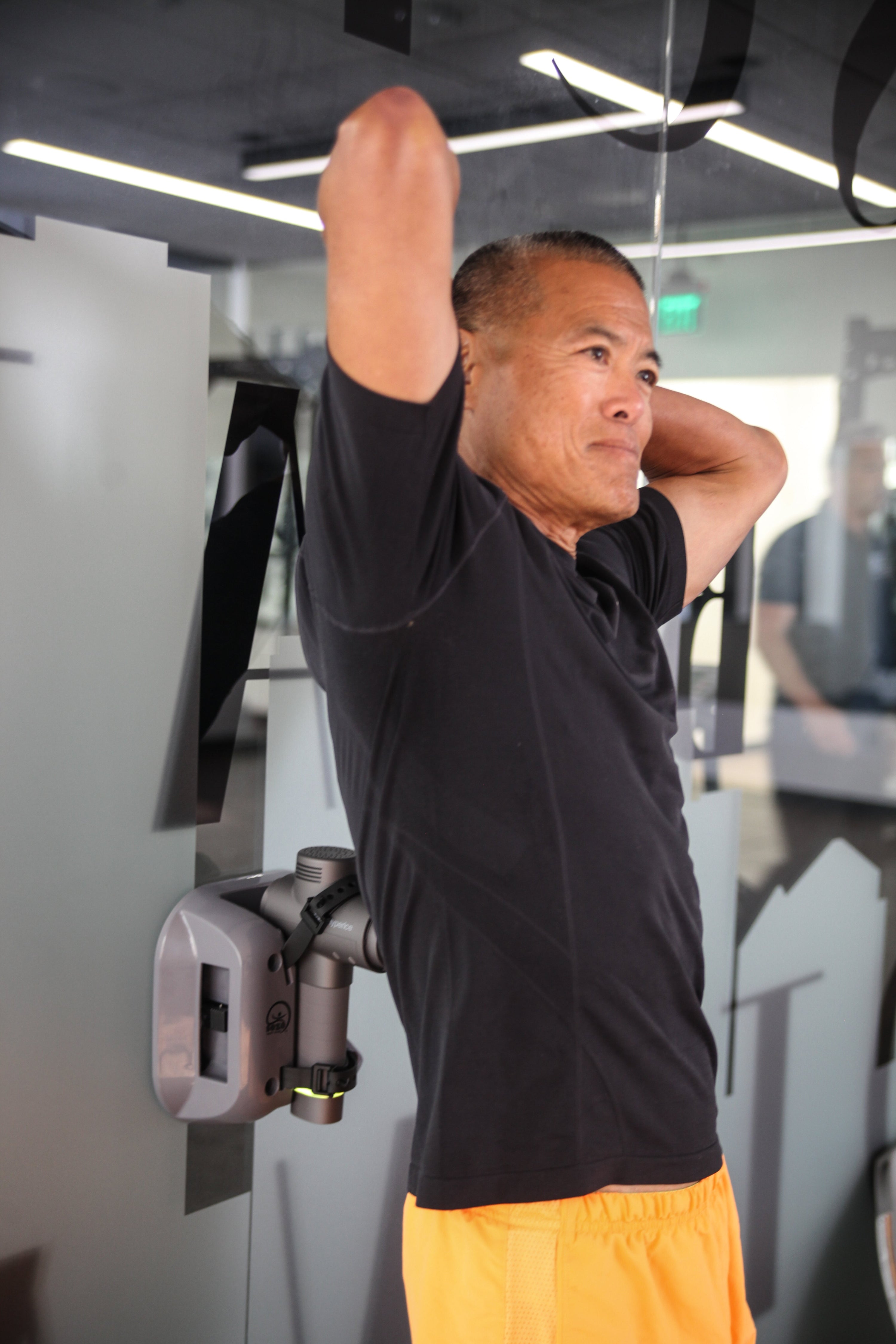 How to Use a Massage Gun for Lower Back Pain When You Can’t Reach (The Complete Guide)